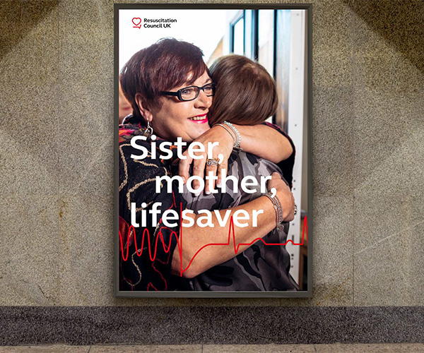 A poster showing two women hugging, with the text "Sister Mother Lifesaver"