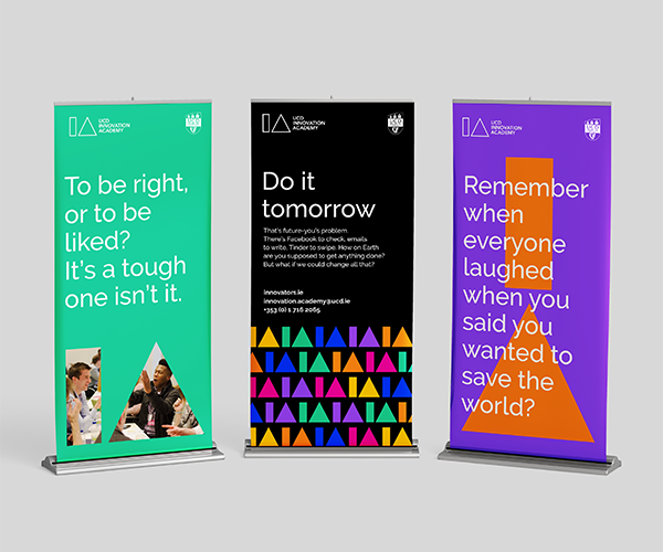 3 pull up banner stands mocked up in the new Innovation Academy brand