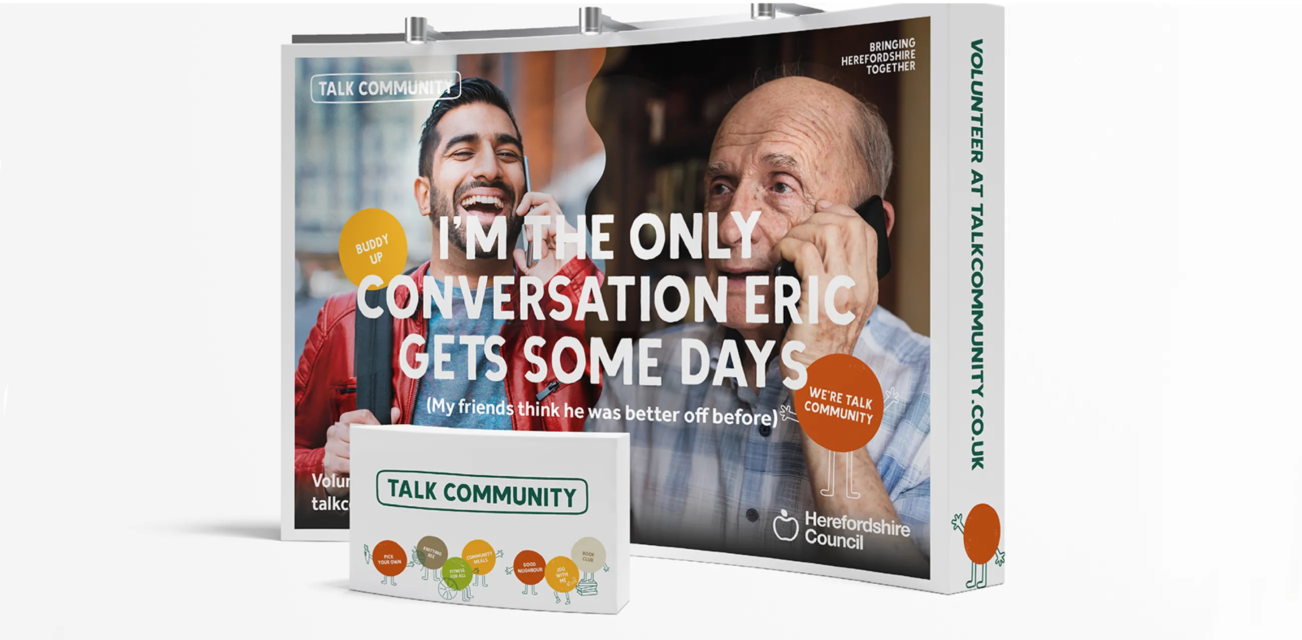 Talk Community exhibition stand - image shows a young man on the phone to an elderly man. "I'm the only conversation Eric gets these days. (My friends think he was better off before.)"