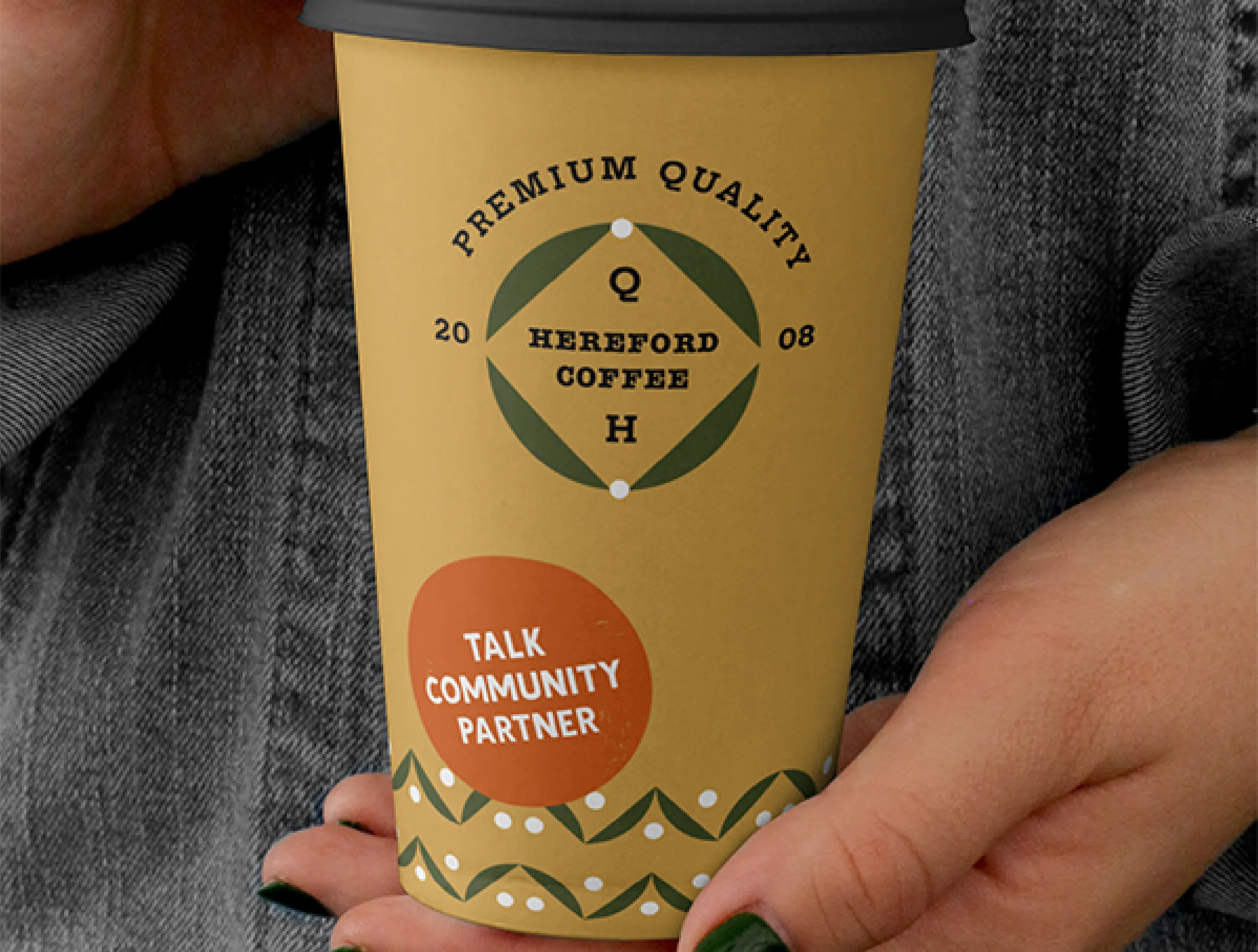 Talk Community sticker on a Coffee cup 