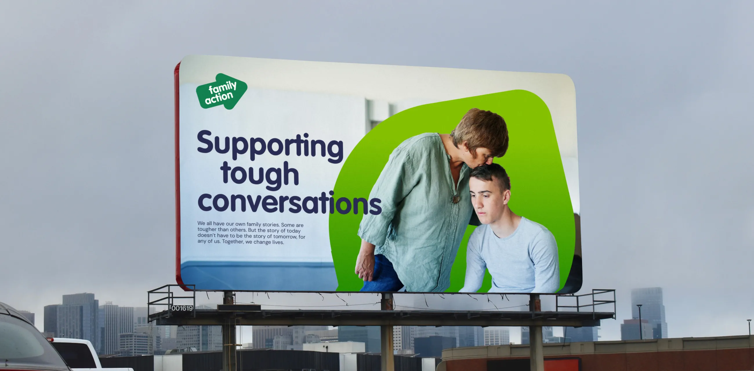 Family Action outdoor advertisement showing a mother and son in a somber setting with text saying 'Supporting tough conversations'